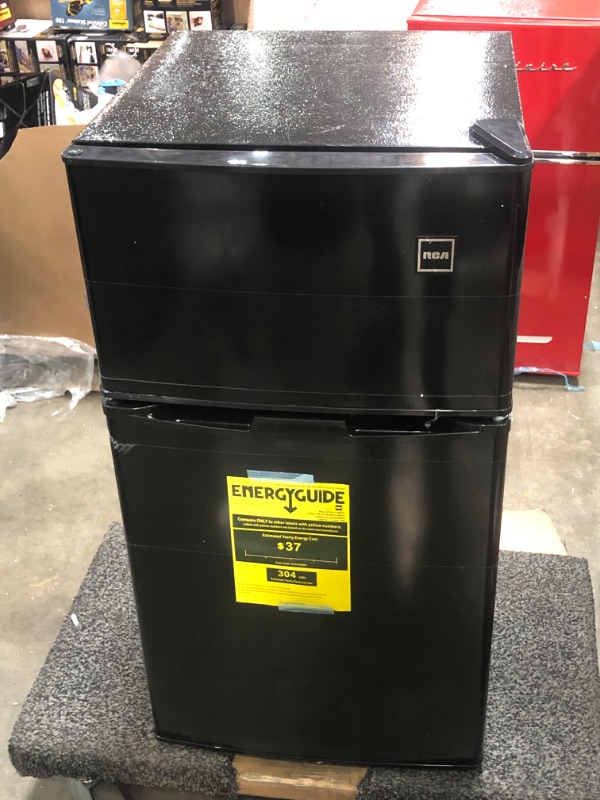 Photo 1 of RCA 3.2 Cu Ft Two Door Mini Fridge with Freezer RFR835, Black
