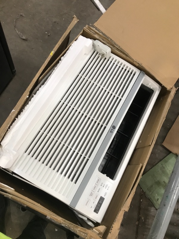 Photo 2 of parts only
12000 BTU 115V Window-Mounted Air Conditioner with Remote Control
