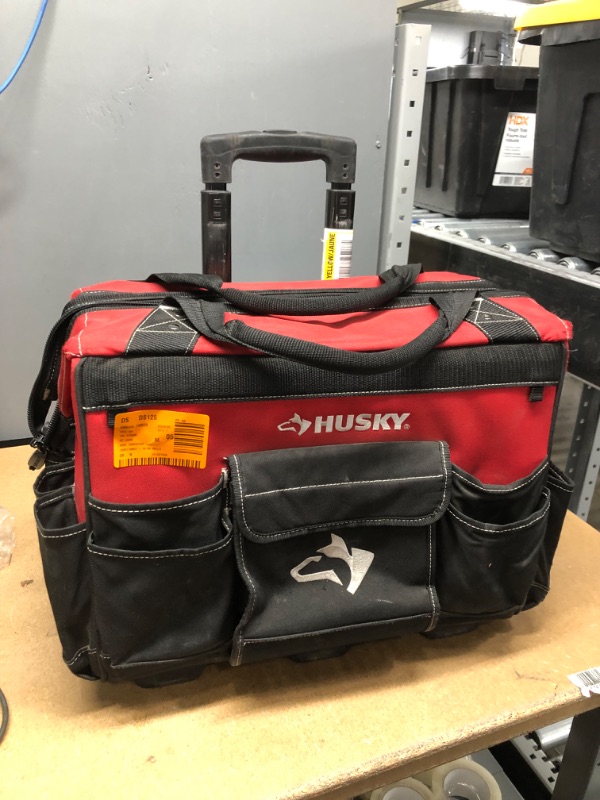 Photo 3 of USED CONDITION, GOOD CONDITION, Husky GP-43196N13 18" 600-Denier Red Water Resistant Contractor's Rolling Tool Tote Bag with Telescoping Handle
