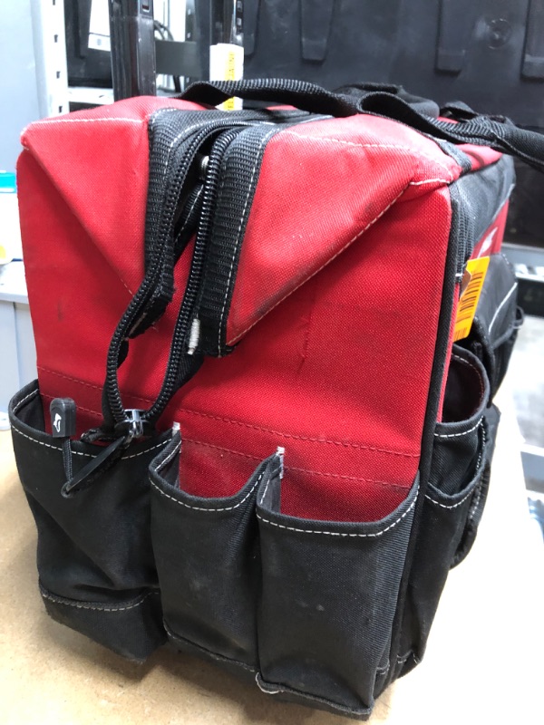 Photo 2 of USED CONDITION, GOOD CONDITION, Husky GP-43196N13 18" 600-Denier Red Water Resistant Contractor's Rolling Tool Tote Bag with Telescoping Handle
