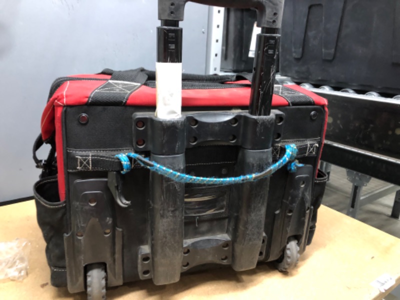 Photo 1 of USED CONDITION, GOOD CONDITION, Husky GP-43196N13 18" 600-Denier Red Water Resistant Contractor's Rolling Tool Tote Bag with Telescoping Handle
