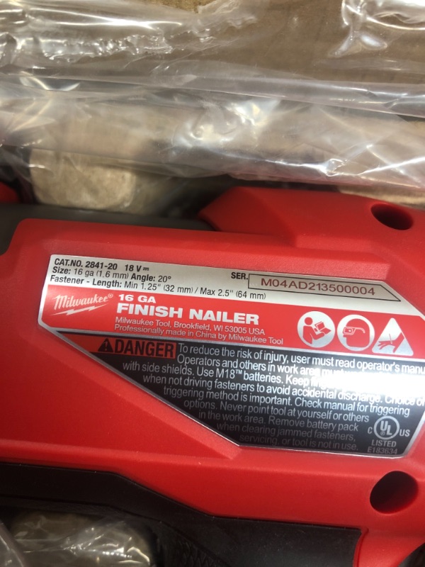 Photo 3 of "Milwaukee 2841-20 M18 FUEL Ergonomic 16 Gauge Angled Finish Nailer - Bare Tool"
tool only