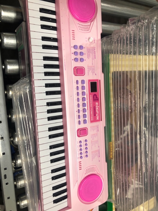 Photo 2 of aPerfectLife 25" Charging Piano Keyboard for Kids 61 Keys Multifunction Portable Piano Electronic Keyboard Music Instrument for Kids Early Learning Educational Toy (Pink)
