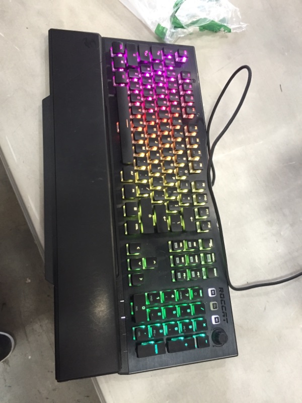 Photo 3 of ROCCAT Vulcan Pro Linear Optical PC Gaming Keyboard, Titan Switch Full Size with Per Key AIMO RGB Lighting, Anodized Aluminum Top Plate and Detachable Palm/Wrist Rest, Low Profile, Black
**LOWER PAD CAME OFF, GREAT WORKING CONDITION**
