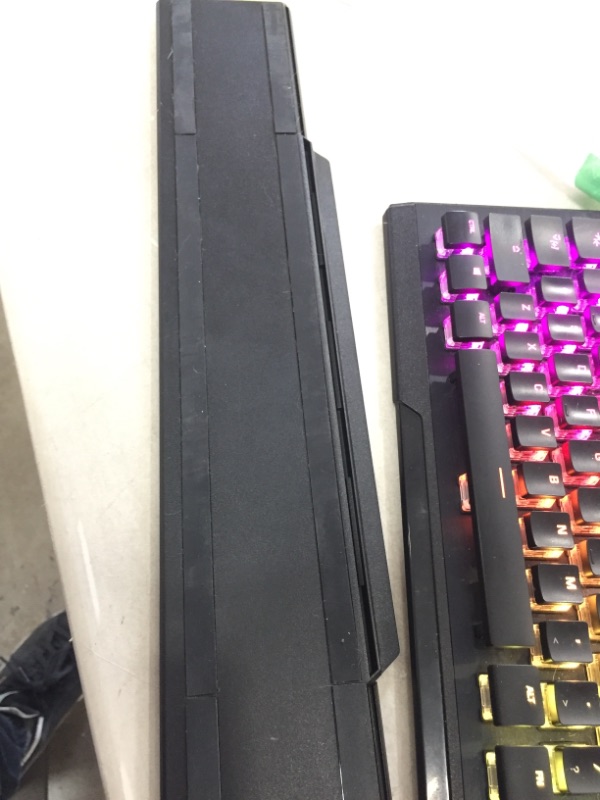 Photo 2 of ROCCAT Vulcan Pro Linear Optical PC Gaming Keyboard, Titan Switch Full Size with Per Key AIMO RGB Lighting, Anodized Aluminum Top Plate and Detachable Palm/Wrist Rest, Low Profile, Black
**LOWER PAD CAME OFF, GREAT WORKING CONDITION**
