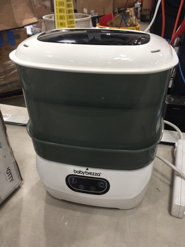 Photo 3 of USED Baby Brezza Sterilizer & Dryer Advanced, Effective Steam Sterilization, HEPA Filter, Dries 33% Faster, Highest Capacity, Holds 8 Bottles & 2 Pump Part
