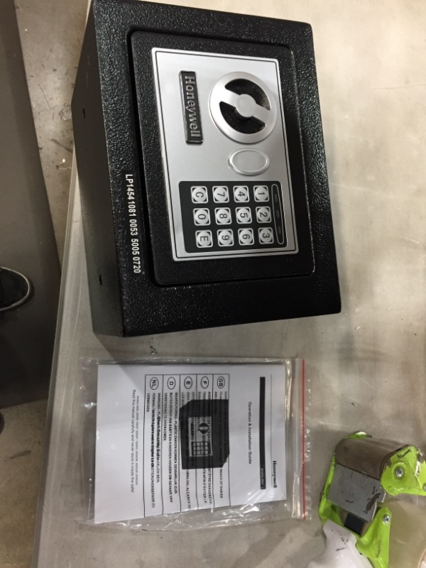 Photo 1 of Honeywell Steel Security Safe .17 cu ft - Black
**COULD NOT GET TO OPEN**