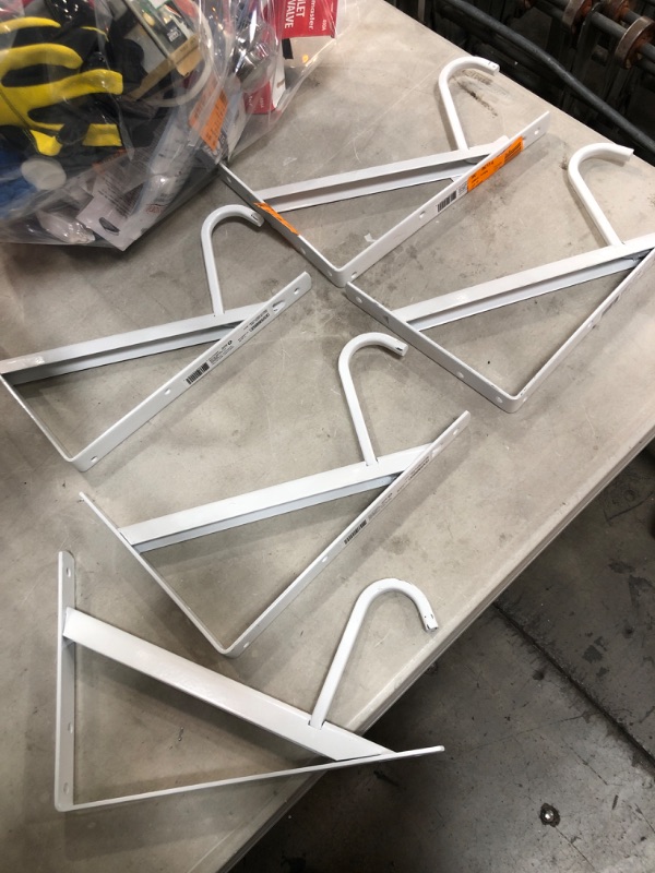 Photo 2 of *MISSING plastic "u" pieces and hardware*
Everbilt 8 in. x 12.4 in. x 1.05 in. Heavy Duty 300 lbs. Shelf and Rod Bracket White, 5 pk