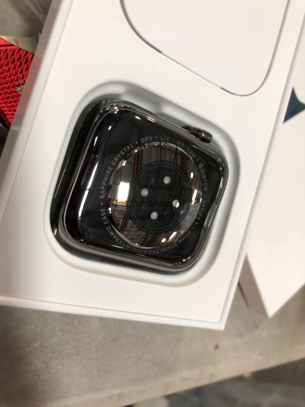 Photo 4 of brand new!!**
Apple Watch Series 7 GPS + Cellular, 45mm Graphite Stainless Steel Case with Abyss Blue Sport Band - Regular
(Item was Open to Verify Contents and Serial Number)
