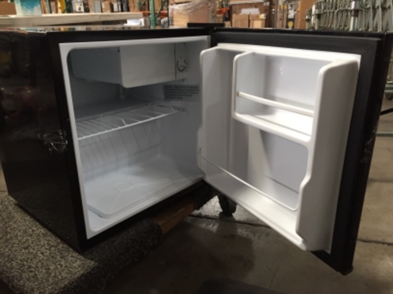 Photo 3 of 1.6 Cu. Ct. Compact Refrigerator (black) with reversible door ( for parts only Non refundable)