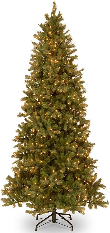 Photo 1 of **SOME LIGHTS ARE NON-FUNCTIONAL AS SHOWN** National Tree Company Pre-lit 'Feel Real' Artificial Slim Downswept Christmas Tree, Green, Douglas Fir, White Lights, Includes Stand, 9 feet
