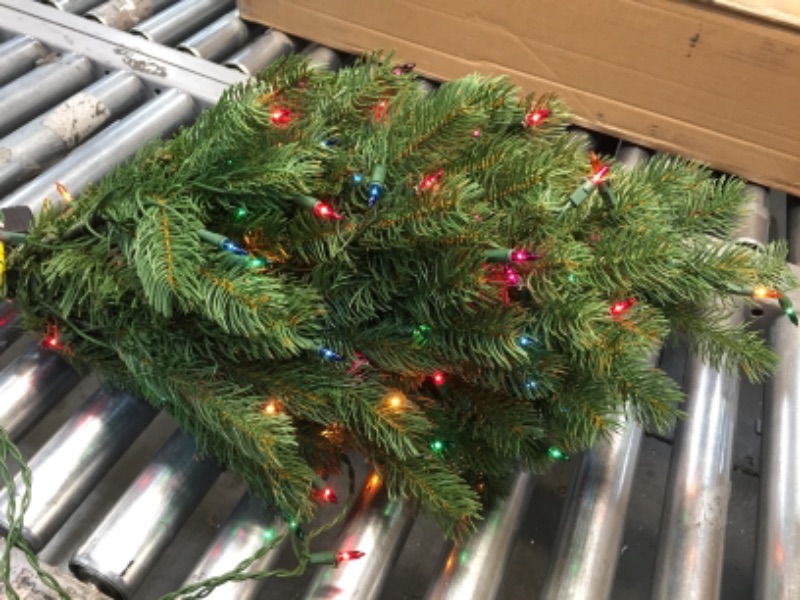 Photo 2 of **IN SOME SECTIONS LIGHTS DO NOT LIGHT UP** National Tree Company Pre-Lit 'Feel Real' Artificial Full Downswept Christmas Tree, Green, Douglas Fir, Multicolor Lights, Includes Stand, 4.5 feet
