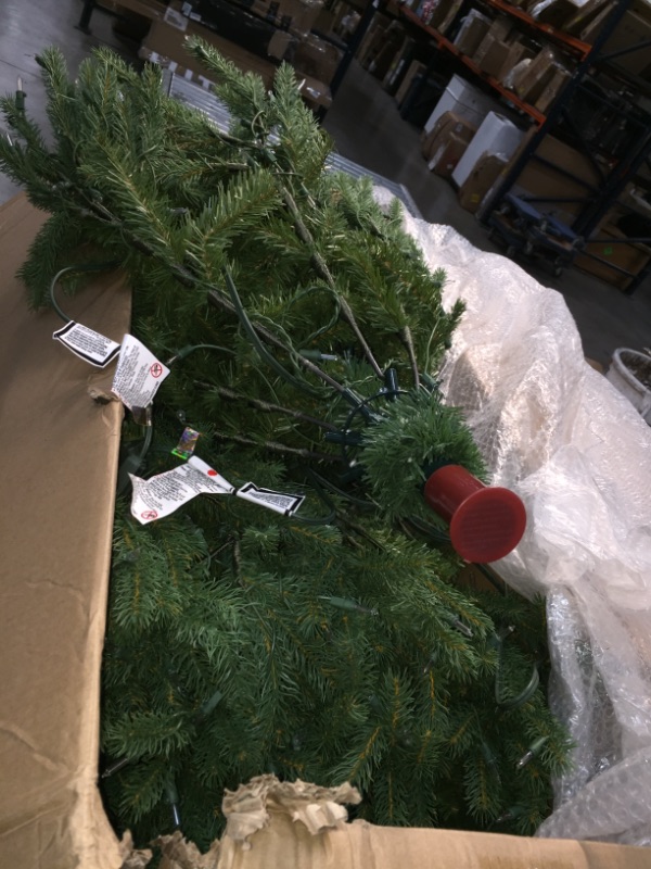 Photo 3 of **SOME LIGHTS ARE NOT FUNCTIONAL** National Tree Company 'Feel Real' Pre-lit Artificial Christmas Tree | Includes Pre-strung White Lights and Stand | Jersey Fraser Fir - 6.5 ft
