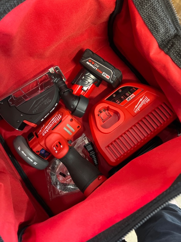 Photo 2 of **incomplete*** Milwaukee
M12 FUEL 12-Volt 3 in. Lithium-Ion Brushless Cordless Cut Off Saw Kit with One 4.0 Ah Battery Charger and Bag