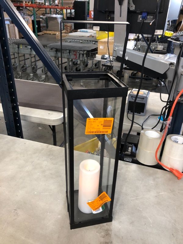 Photo 2 of (STOCK PHOTO INACCURATELY REFLECTS ACTUAL PRODUCT) 21" height square glass lantern with electrical candle