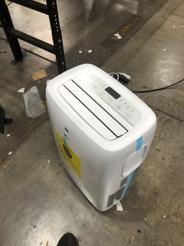 Photo 3 of LG 7,000 BTU (DOE) / 10,000 BTU (ASHRAE) Portable Air Conditioner, Cools 300 Sq.Ft. (12' x 25' room size), Quiet Operation, LCD Remote, Window Installation Kit Included, 115V
