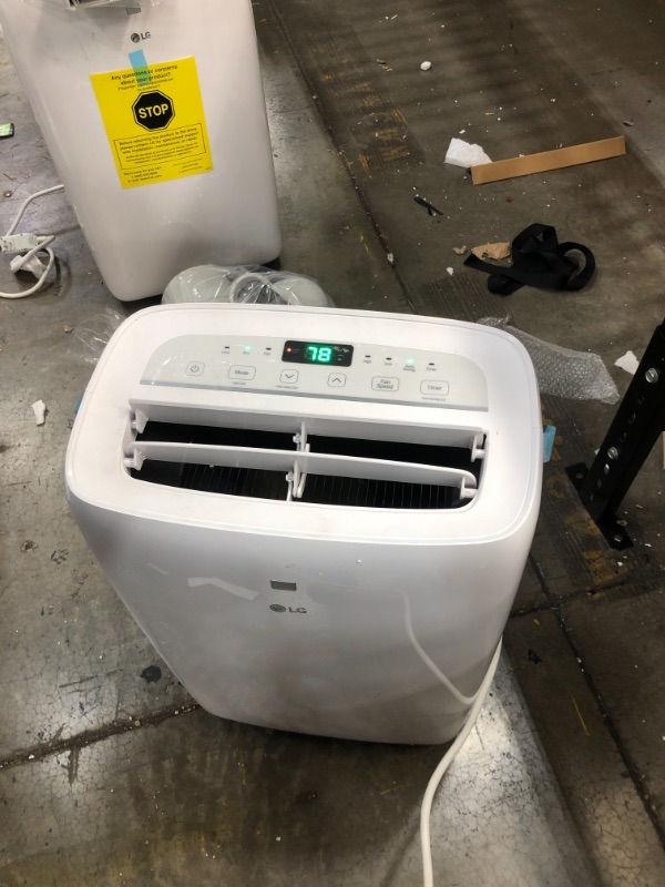 Photo 2 of LG 7,000 BTU (DOE) / 10,000 BTU (ASHRAE) Portable Air Conditioner, Cools 300 Sq.Ft. (12' x 25' room size), Quiet Operation, LCD Remote, Window Installation Kit Included, 115V
