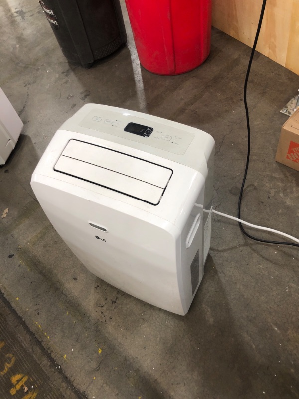 Photo 2 of LG 115V Portable Air Conditioner with Remote Control in White for Rooms up to 200 Sq. Ft.
