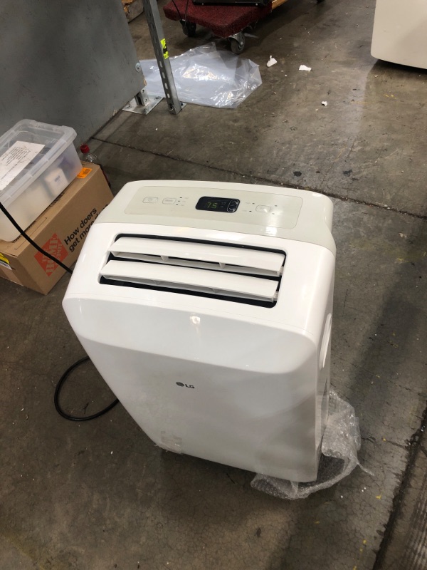 Photo 2 of LG 115V Portable Air Conditioner with Remote Control in White for Rooms up to 200 Sq. Ft.
