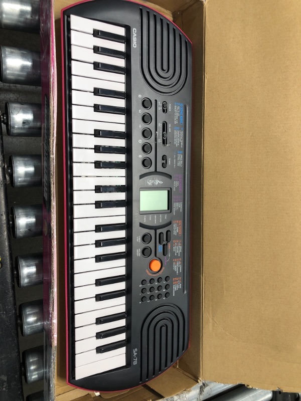 Photo 3 of Casio SA-78 44 Key Mini Personal Keyboard
**MISSING POWER CORD**
**PINK** In color
