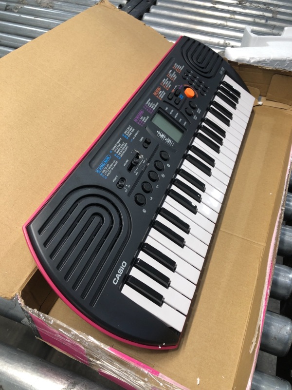 Photo 2 of Casio SA-78 44 Key Mini Personal Keyboard
**MISSING POWER CORD**
**PINK** In color
