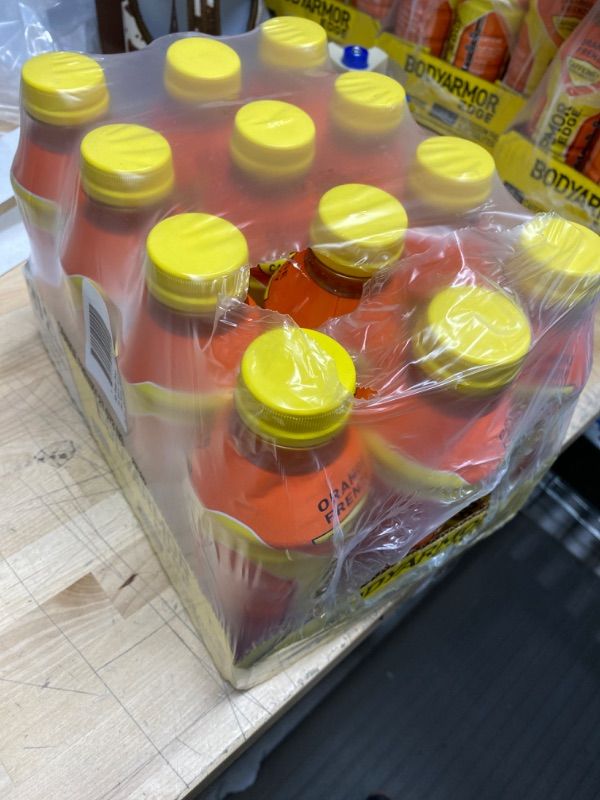Photo 1 of ** MANUFACTURE DATE : 03/14/2021** BODYARMOR EDGE Sports Drink with Caffeine, Orange Frenzy, Potassium-Packed Electrolytes, Caffeine Boost, Natural Flavors With Vitamins, Perfect for Athletes 20.2 Fl Oz (Pack of 12) NO PRINTED EXP DATE - NON REFUNDABLE 

