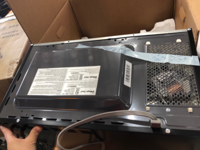 Photo 1 of 1.1 cu. ft. Countertop Microwave in Black with Gray Cavity
