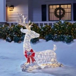 Photo 1 of (Used) 3.5 ft Polar Wishes White LED Lying Deer Yard Sculpture
