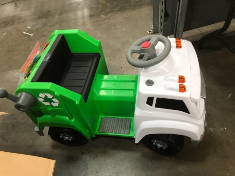 Photo 4 of Kid Trax Real Rigs Toddler Recycling Truck Interactive Ride On Toy, Kids Ages 1.5-4 Years, 6 Volt Battery and Charger, Sound Effects, 9 Recycling Accessories Included (KT1535TG) , Green
