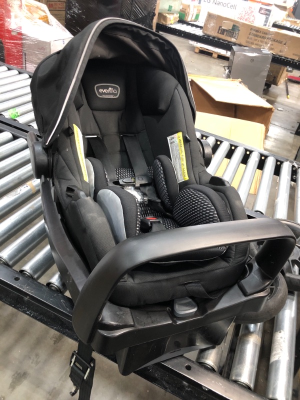 Photo 2 of (Used) Evenflo Pivot Xpand Modular Travel System with SafeMax Infant Car Seat
