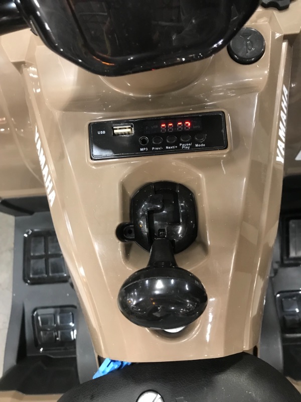 Photo 5 of PARTS ONLY; BATTERY DOES NOT CHARGE**
Kid Trax Yamaha ATV Toddler/Kids Electric Ride On Toy, 12 Volt, 3-7 yrs Old, Max Weight 88 lbs, Single Rider, MP3 Player Input, Kodiak Tan
