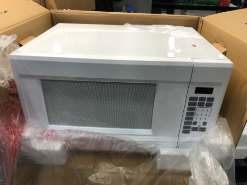 Photo 2 of GE - 1.4 cu. ft. Countertop Microwave in White