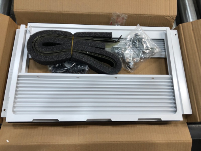 Photo 4 of LG 12,000 BTU 115V Window-Mounted Air Conditioner with Remote Control, White, parts only
