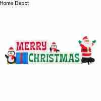 Photo 1 of Home Accents Holiday 11.5 ft Pre-Lit LED Giant-Sized Airblown Merry Christmas Sign with Santa and Penguin Scene Inflatable
