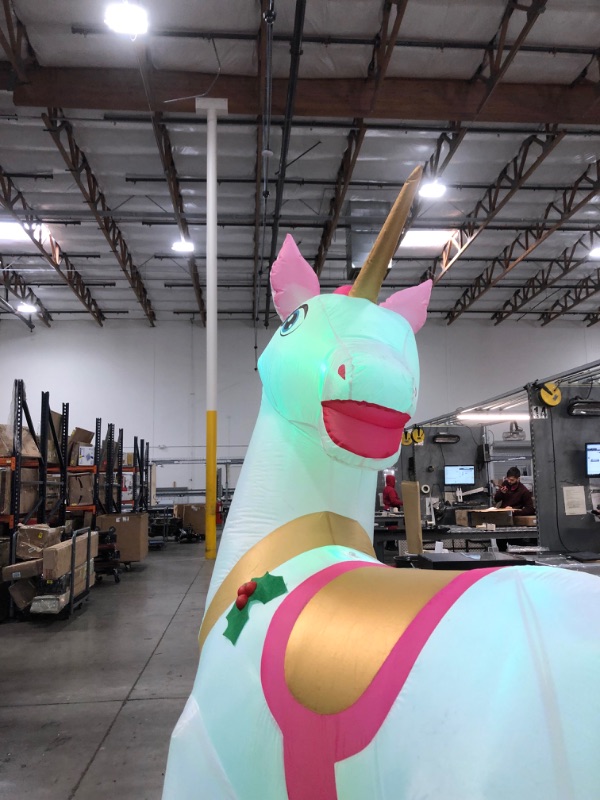 Photo 4 of 7 ft. Pre-Lit LED Lightshow Plush Color Changing Unicorn Christmas Inflatable
