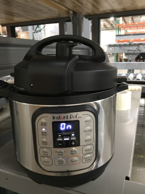 Photo 3 of **PREVIOUSLY USED**
Instant Pot Duo 7-in-1 Electric Pressure Cooker, Slow Cooker, Rice Cooker, Steamer, Sauté, Yogurt Maker, Warmer & Sterilizer, 3 Quart, Stainless Steel/Black
