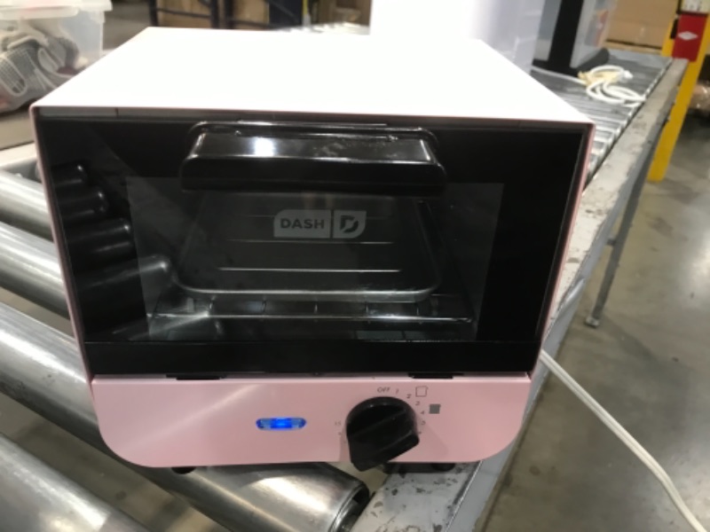 Photo 2 of TESTED WORKS**
Dash Mini Toaster Oven Cooker for Bread, Bagels, Cookies, Pizza, Paninis & More with Baking Tray, Rack, Auto Shut Off Feature - Pink
