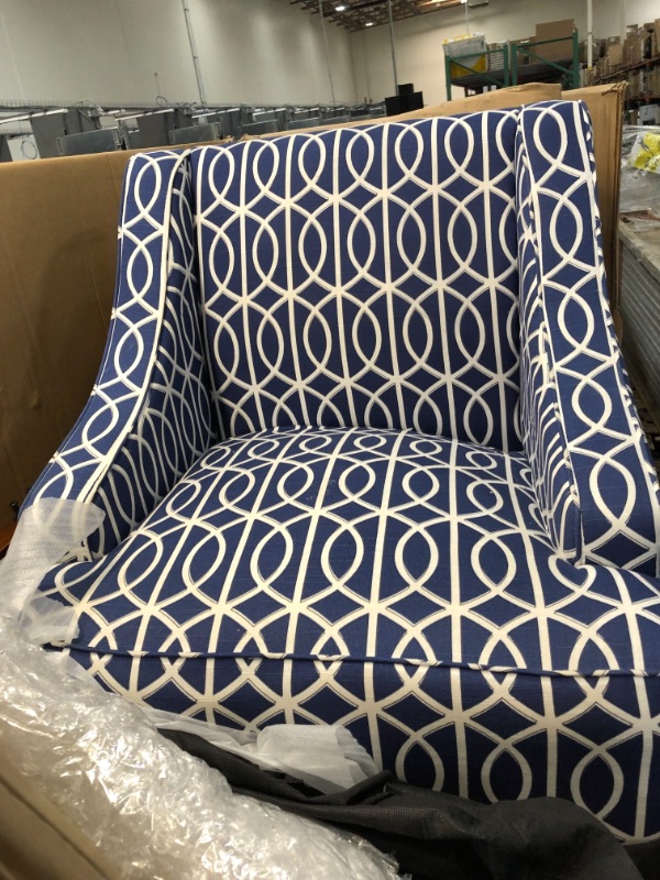 Photo 2 of **GENERAL POST**
BLUE UPHOLSTERED CHAIR WITH  GEOMETRIC SHAPED WHITE LINES AND WALNUT COLORED WOODEN LEGS