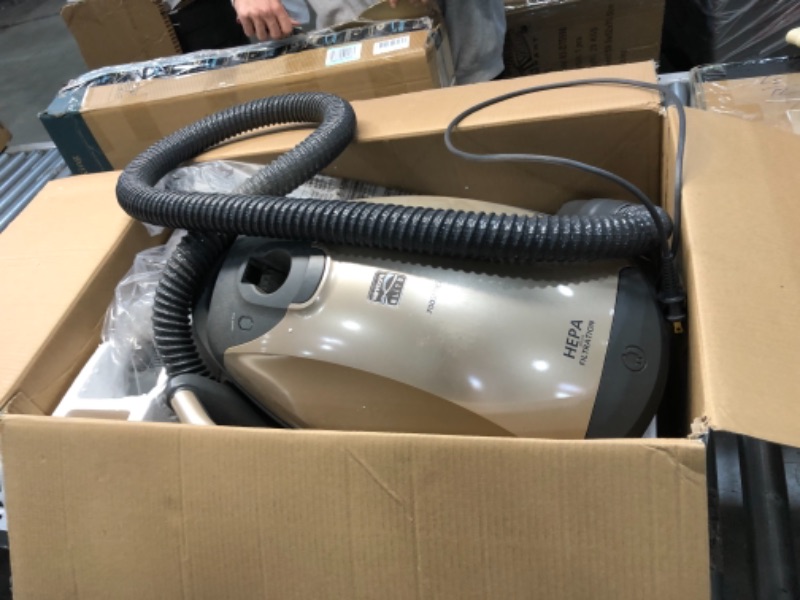 Photo 2 of **PARTS ONLY, VACUUM DOES NOT TURN ON WHEN PLUGGED IN TO POWER OUTLET**
Kenmore 700 Series Ultra Plush Lightweight Bagged Canister Vacuum with Pet PowerMate, HEPA, Extended Telescoping Wand, Retractable Cord, and 3 Cleaning Tools, Champagne
