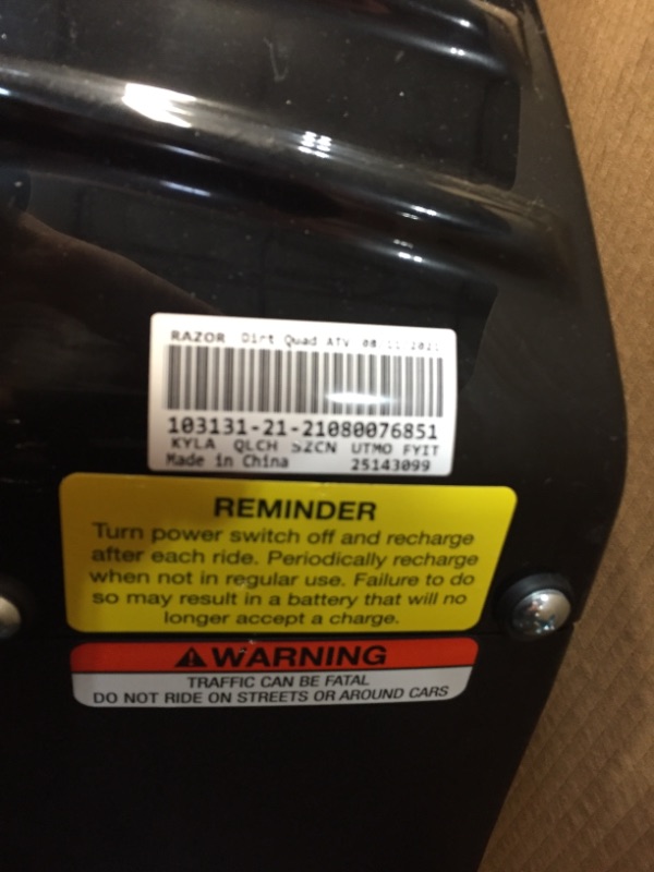 Photo 9 of Razor Dirt Quad - 24V Electric 4-Wheeler ATV - Twist-Grip Variable-Speed Acceleration Control, Hand-Operated Disc Brake, 12" Knobby Air-Filled Tires
