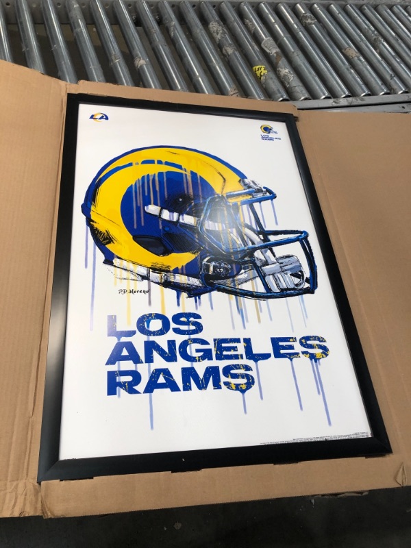 Photo 3 of (CRACKED FRAME)
Trends International NFL Los Angeles Rams - Drip Helmet 20 Wall Poster, 22.375" x 34", Black Framed Version
