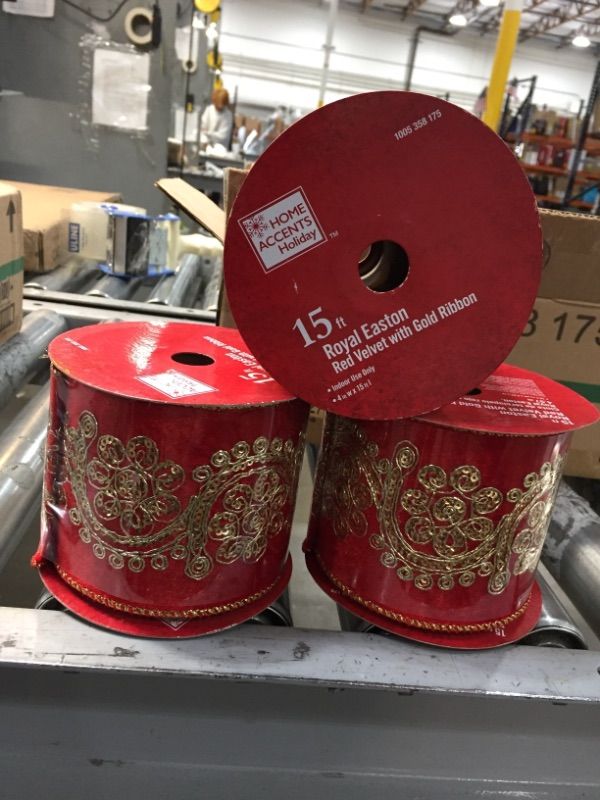 Photo 1 of **THREE ROLLS PER BOX**
15 FT. ROYAL EASTON RED VELVET WITH GOLD RIBBON 4"W X 15' L