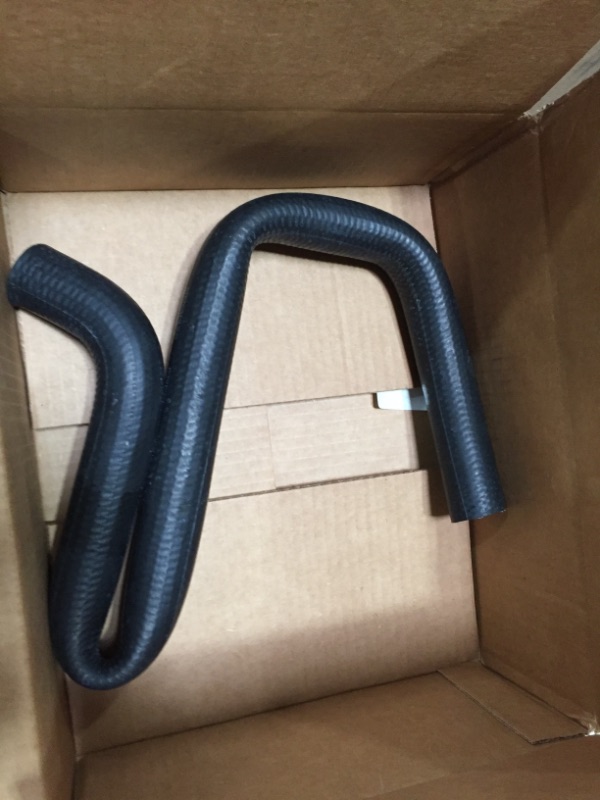 Photo 1 of **GENERAL POST**
34" BLACK RUBBER HOSE 1.5" WIDE