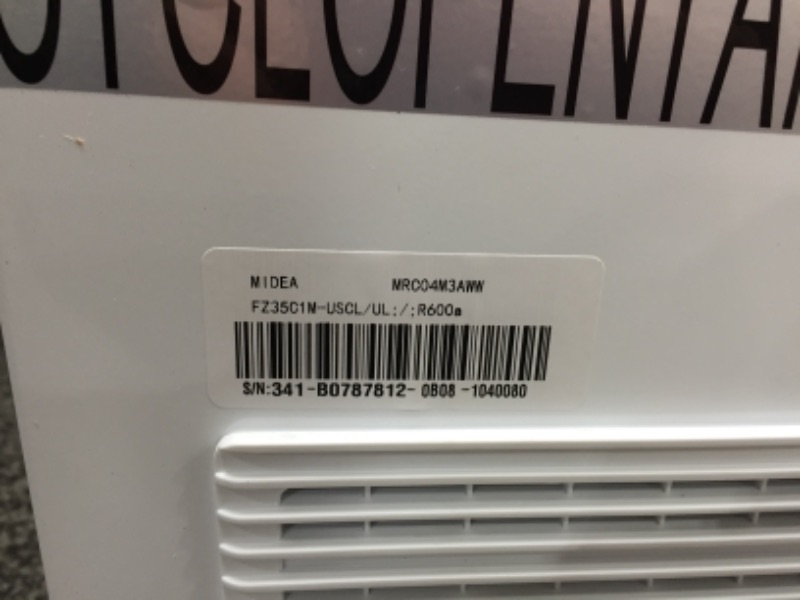 Photo 3 of **SMALL DENT TO TOP LEFT CORNER OF FREEZER**
Midea MRC04M3AWW, White 3.5 cu. ft. Mini Freezer, Cubic Feet
