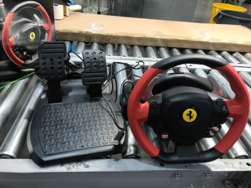Photo 2 of **DOES NOT TURN ON WHEN PLUGGED IN**
Thrustmaster Racing Wheel Ferrari 458 Spider Edition (XBOX Series X/S, One, PC)
