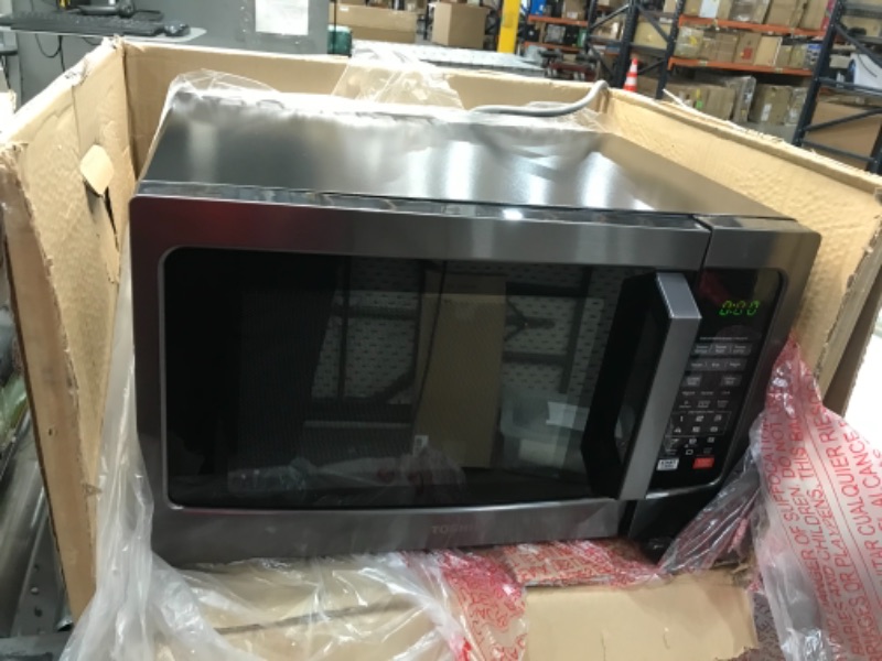 Photo 1 of **NUMBER PAD IS LOOSE BUT FUNCTIONS**
Toshiba EM131A5C-BS Microwave Oven with Smart Sensor, Easy Clean Interior, ECO Mode and Sound On/Off, 1.2 Cu Ft, Black Stainless Steel
