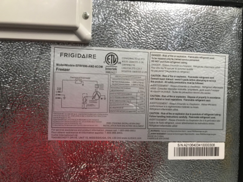 Photo 8 of **FRIDGE DOOR IS DETACHED FROM TOP HINGE**DENTS TO FRIDGE BODY REFER TO PHOTO**
Frigidaire EFRF696-AMZ Upright Freezer 6.5 cu ft Stainless Platinum Design Series
