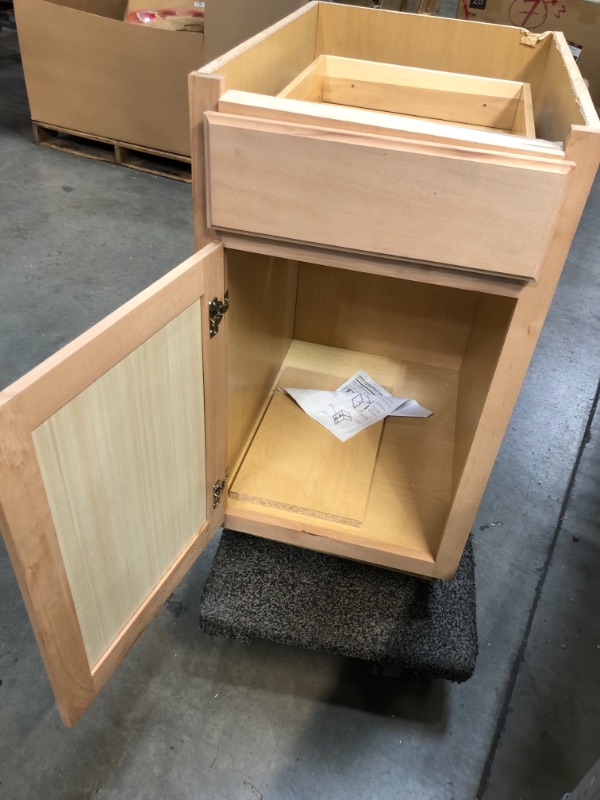 Photo 1 of *Damage shown in picture*
Hampton Bay Hampton Unfinished Beech Recessed Panel Stock Assembled Base Kitchen Cabinet (18 in. X 34.5 in. X 24 in.)