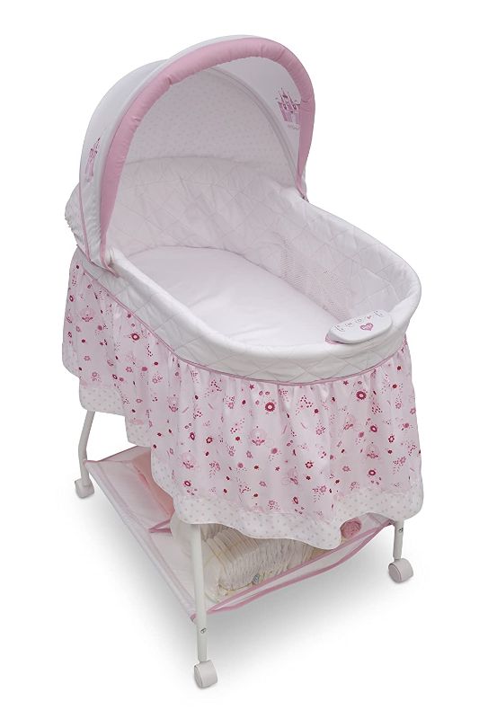 Photo 1 of Disney Baby Ultimate Sweet Beginnings Bedside Bassinet - Portable Crib with Lights, Sounds and Vibrations, Disney Princess
