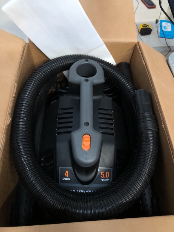 Photo 2 of 4 Gallon 5.0-Peak HP Portable Wet/Dry Shop Vacuum with Fine Dust Filter, Hose and Accessories
